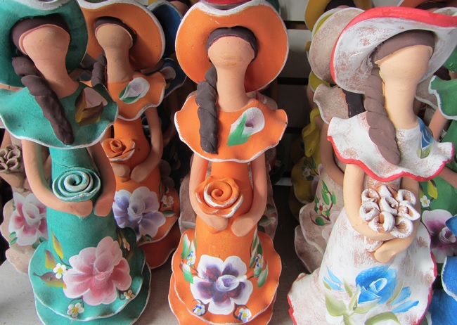 Souvenirs To Buy In The Dominican Republic faceless statues
