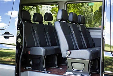 Passenger seating inside a Santo Domingo Taxi group van