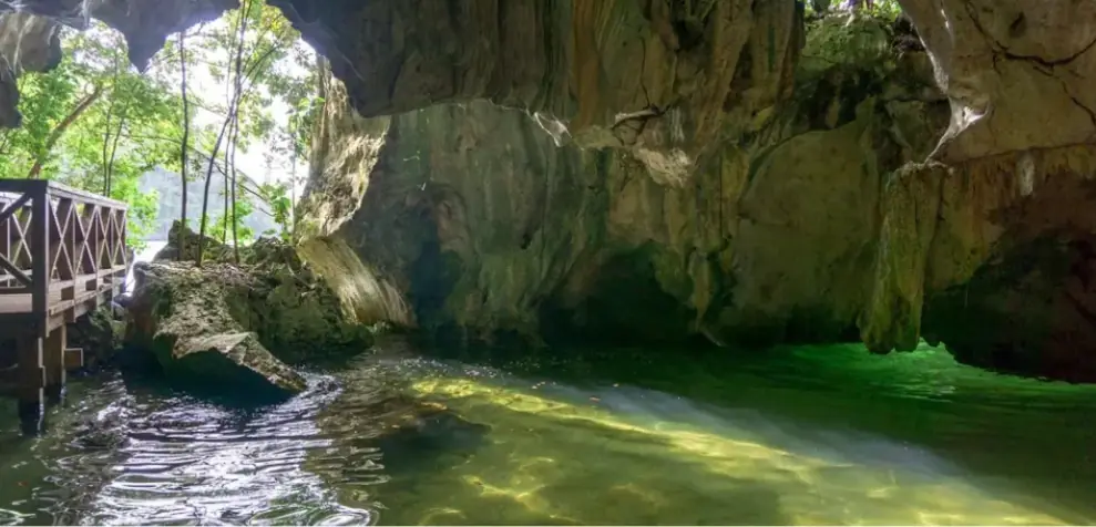 Limestone cave and green water in Los Haitises National Park